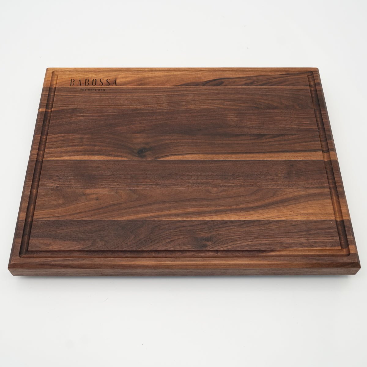 BABOSSA | Nussbaum Schneidebrett L | Naturkante | Saftrille | 44,5x35x4,5 cm - Grillstar.deBABOSSA | Nussbaum Schneidebrett L | Naturkante | Saftrille | 44,5x35x4,5 cmHolzbrettBABOSSAGrillstar.de