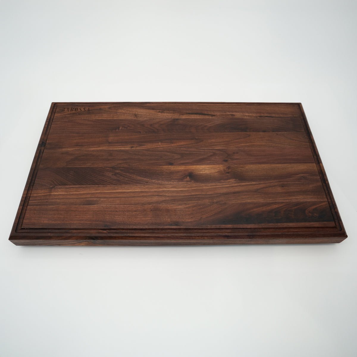 BABOSSA | Nussbaum Schneidebrett XL | Naturkante | Saftrille | 70x40x6 cm - Grillstar.deBABOSSA | Nussbaum Schneidebrett XL | Naturkante | Saftrille | 70x40x6 cmHolzbrettBABOSSAGrillstar.de