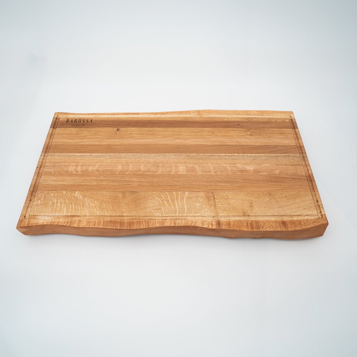 BABOSSA | Eichen Schneidebrett XL | Naturkante | Saftrille | 70x40x6 cm - Grillstar.deBABOSSA | Eichen Schneidebrett XL | Naturkante | Saftrille | 70x40x6 cmHolzbrettBABOSSAGrillstar.de