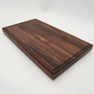 BABOSSA | Nussbaum Schneidebrett XL | Naturkante | Saftrille | 70x40x6 cm - Grillstar.deBABOSSA | Nussbaum Schneidebrett XL | Naturkante | Saftrille | 70x40x6 cmHolzbrettBABOSSAGrillstar.de